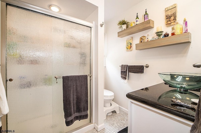 9 Saddle Rdg, Egg Harbor Township, NJ 08234 - full bath with a shower stall, toilet, baseboards, tile patterned flooring, and vanity