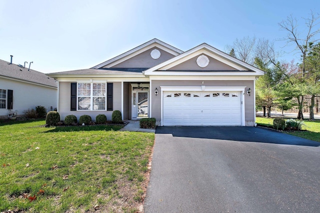 ranch-style house with a front lawn, an attached garage, and aphalt driveway