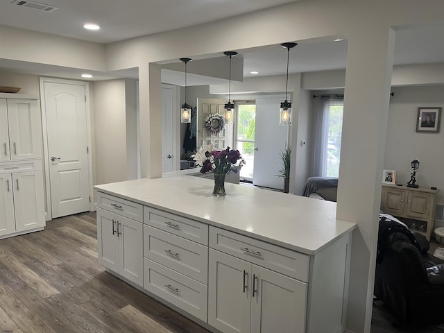 24 Greate Bay Dr Unit 24, Somers Point, NJ 08244 - kitchen featuring dark wood-type flooring, white cabinetry, decorative light fixtures, light countertops, and recessed lighting