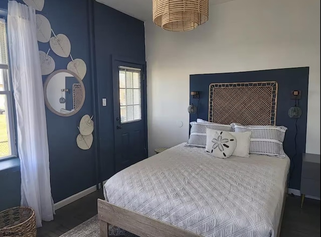 bedroom featuring baseboards