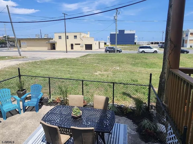 view of yard featuring a patio area and fence