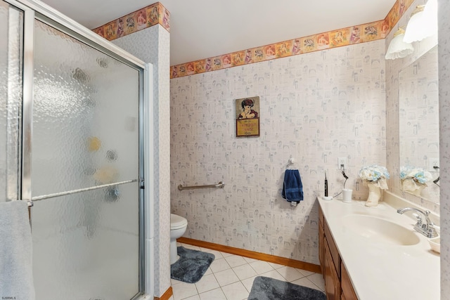 bathroom featuring a shower stall, tile patterned floors, wallpapered walls, vanity, and baseboards