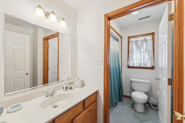 bathroom featuring visible vents, tile patterned flooring, vanity, and toilet