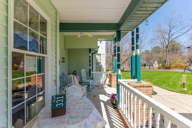 view of patio featuring a porch and a ceiling fan