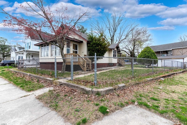 view of home's exterior with a fenced front yard