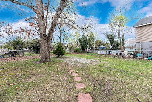 view of yard featuring fence
