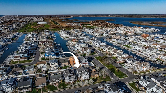 22 Spruce Rd, Ocean City, NJ 08226 - aerial overview of property's location featuring a nearby body of water and numerous boat docks