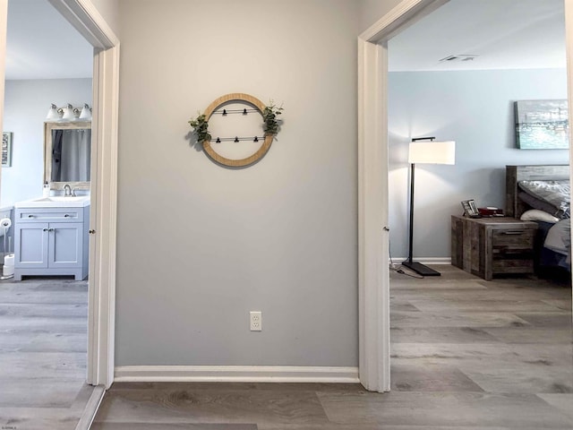 722 Fishers Creek Rd, Galloway Township, NJ 08205 - corridor with wood finished floors, baseboards, and visible vents