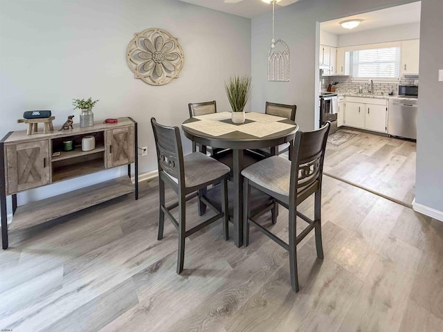 722 Fishers Creek Rd, Galloway Township, NJ 08205 - dining space with baseboards and light wood-style floors