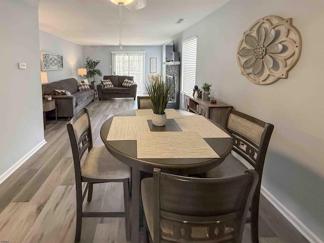 722 Fishers Creek Rd, Galloway Township, NJ 08205 - dining space featuring visible vents, baseboards, and light wood-style floors
