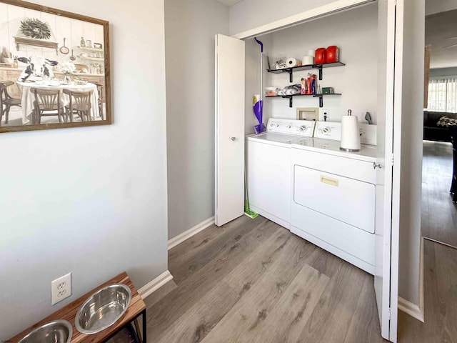 722 Fishers Creek Rd, Galloway Township, NJ 08205 - laundry area with baseboards, independent washer and dryer, laundry area, and wood finished floors