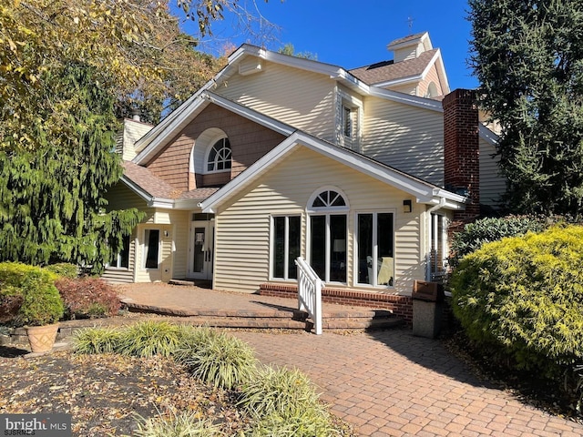 722 Fishers Creek Rd, Galloway Township, NJ 08205 - rear view of property featuring entry steps and a chimney