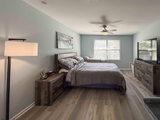 722 Fishers Creek Rd, Galloway Township, NJ 08205 - bedroom with ceiling fan, baseboards, and wood finished floors