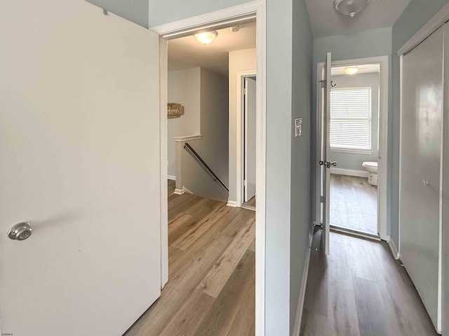 722 Fishers Creek Rd, Galloway Township, NJ 08205 - hallway featuring baseboards, an upstairs landing, and wood finished floors