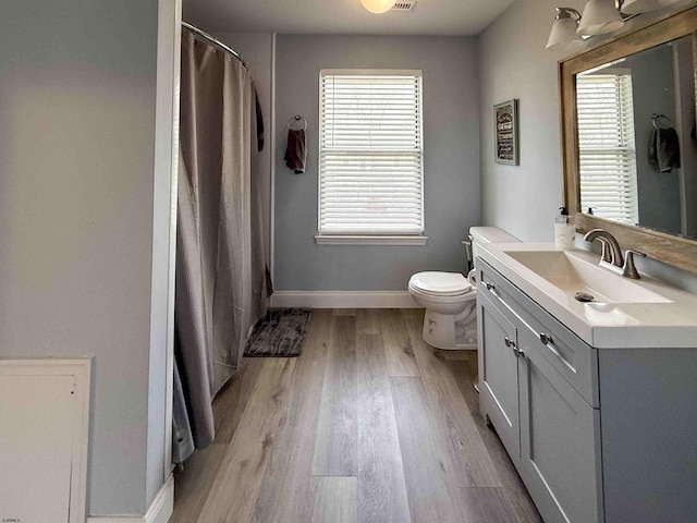 722 Fishers Creek Rd, Galloway Township, NJ 08205 - full bathroom featuring a wealth of natural light, wood finished floors, and baseboards