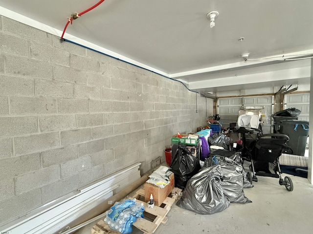 garage featuring concrete block wall