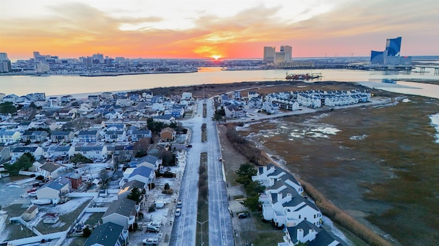 bird's eye view with a water view and a city view