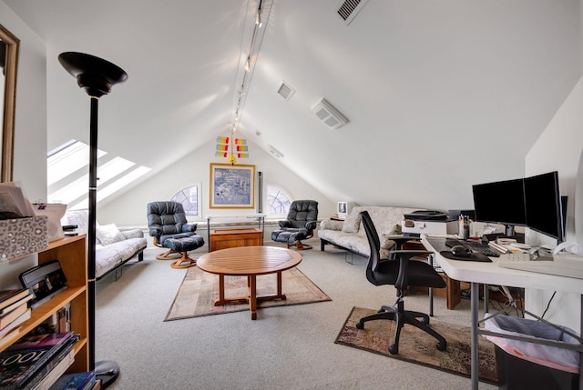 carpeted office space featuring rail lighting, visible vents, and lofted ceiling