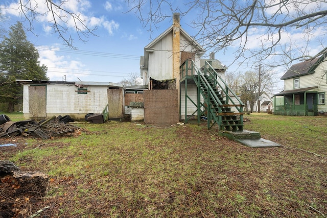 611-615 S New York Rd, Galloway Township, NJ 08205 - view of grassy yard featuring stairs and an outbuilding