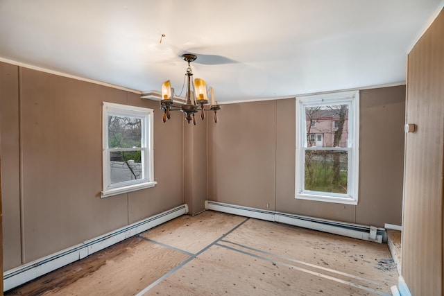 611-615 S New York Rd, Galloway Township, NJ 08205 - empty room featuring a baseboard heating unit, healthy amount of natural light, and a chandelier