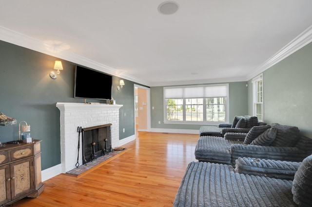 209 Belhaven Ave, Linwood, NJ 08221 - living room with light wood-style flooring, ornamental molding, and a brick fireplace