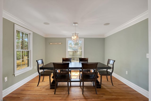 209 Belhaven Ave, Linwood, NJ 08221 - dining space featuring light wood-style floors, crown molding, and a chandelier