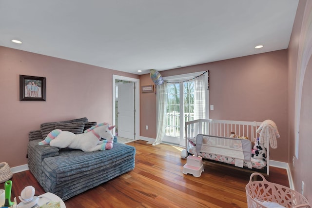 209 Belhaven Ave, Linwood, NJ 08221 - bedroom with access to outside, wood finished floors, and recessed lighting