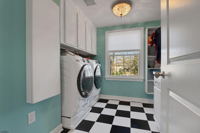 209 Belhaven Ave, Linwood, NJ 08221 - laundry room featuring independent washer and dryer, dark flooring, and cabinet space