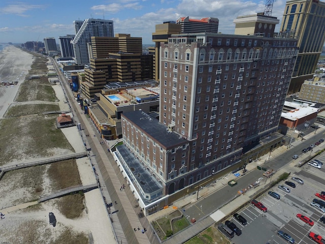birds eye view of property with a view of city