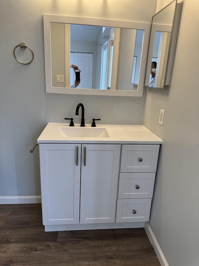 246 Heather Croft Unit 246, Egg Harbor Township, NJ 08234 - bathroom with baseboards, vanity, and wood finished floors