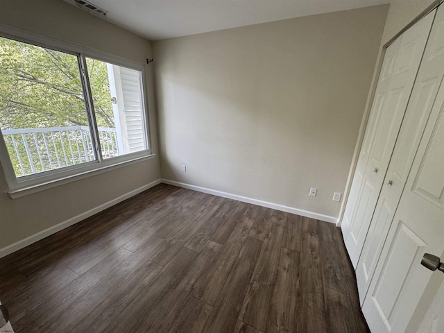 246 Heather Croft Unit 246, Egg Harbor Township, NJ 08234 - unfurnished bedroom with baseboards, visible vents, dark wood-style floors, and a closet