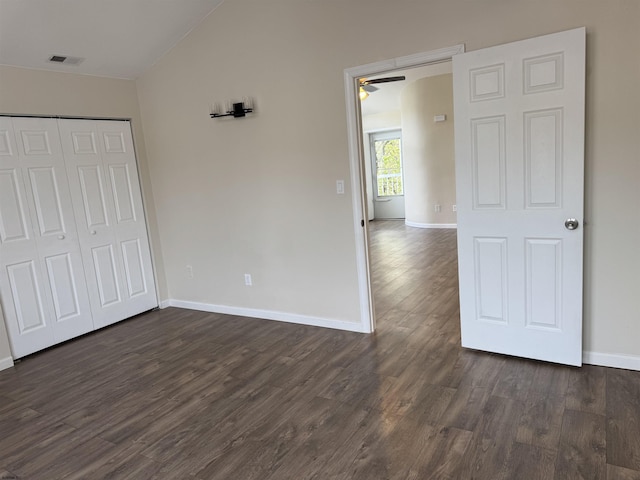 246 Heather Croft Unit 246, Egg Harbor Township, NJ 08234 - unfurnished bedroom with dark wood-style flooring, vaulted ceiling, baseboards, visible vents, and a closet