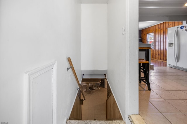 1139 Mcconnell Dr, Pleasantville, NJ 08232 - staircase featuring baseboards, tile patterned flooring, and wooden walls