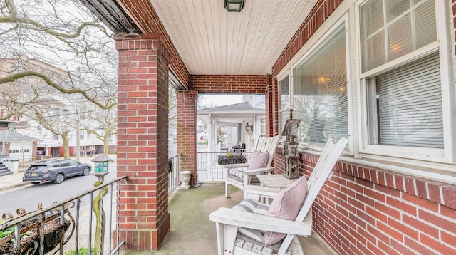 balcony featuring a porch