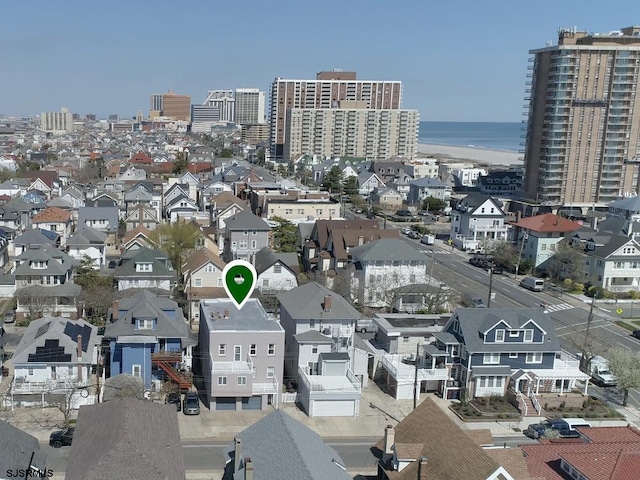 aerial view featuring a residential view and a water view