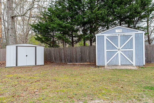 view of shed featuring a fenced backyard