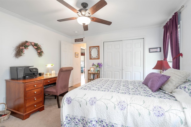 bedroom with a ceiling fan, light carpet, ornamental molding, and a closet
