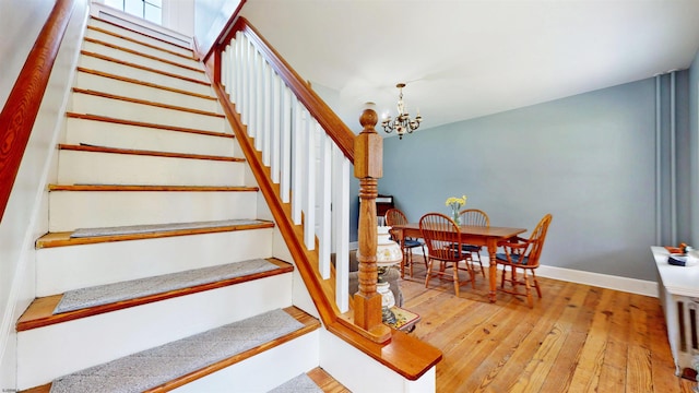 27 Smith Bowen, Galloway Township, NJ 08205 - stairway with wood-type flooring, baseboards, and a notable chandelier