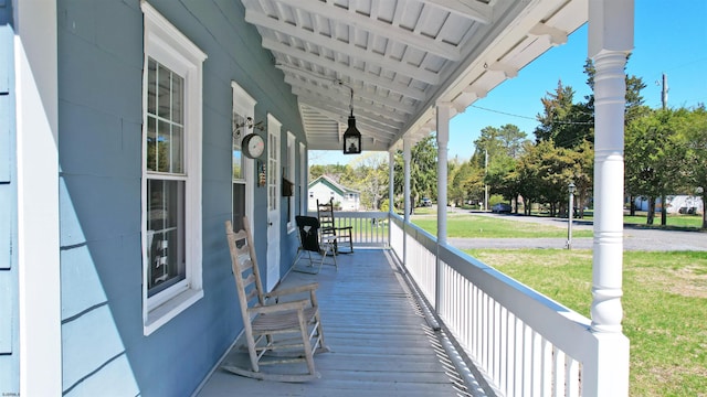 27 Smith Bowen, Galloway Township, NJ 08205 - wooden terrace with a lawn and a porch