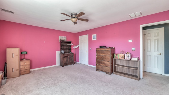 bedroom featuring carpet floors, visible vents, a ceiling fan, and baseboards