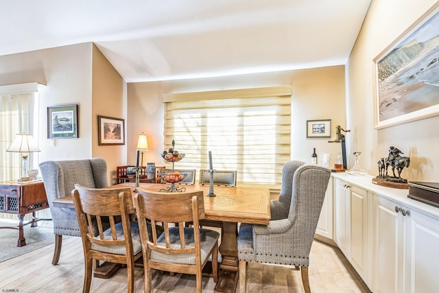 dining area featuring light wood-type flooring