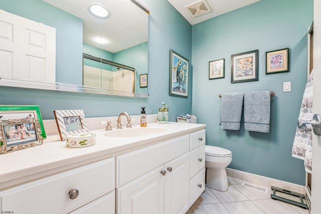 bathroom with visible vents, a shower stall, tile patterned flooring, and vanity