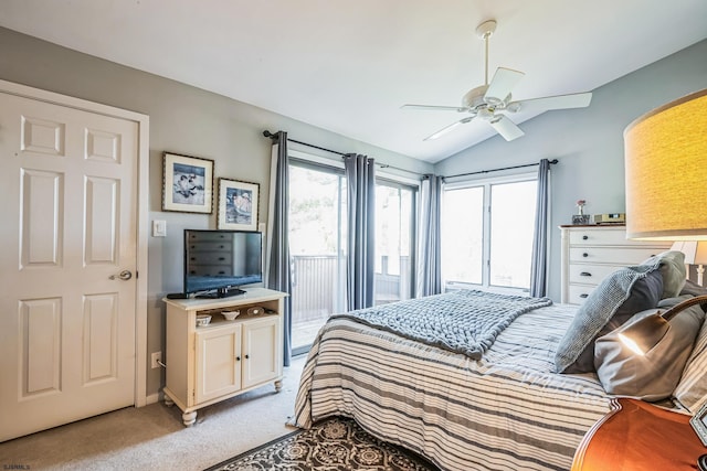bedroom with access to exterior, a ceiling fan, light colored carpet, and vaulted ceiling