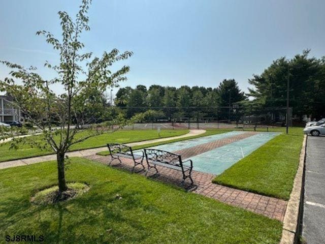 550 Central Ave Unit C4, Linwood, NJ 08221 - view of home's community with shuffleboard and a lawn