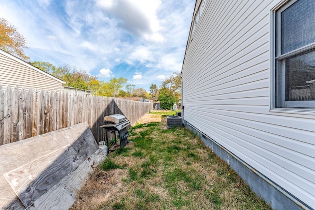 view of home's exterior with fence