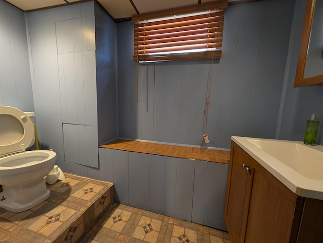 112 Bozarth Ave, Glendora, NJ 08029 - bathroom with tile patterned floors, toilet, vanity, and a decorative wall