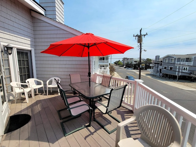 305 57th St Unit 305, Ocean City, NJ 08226 - wooden deck featuring outdoor dining space