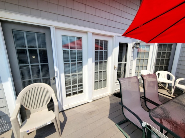 305 57th St Unit 305, Ocean City, NJ 08226 - wooden deck featuring outdoor dining space