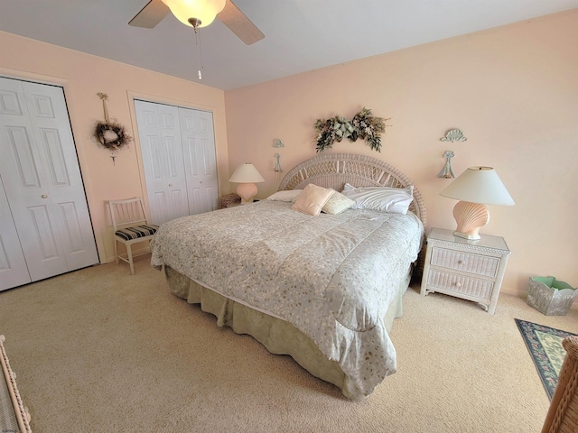 305 57th St Unit 305, Ocean City, NJ 08226 - bedroom featuring two closets, ceiling fan, and carpet floors