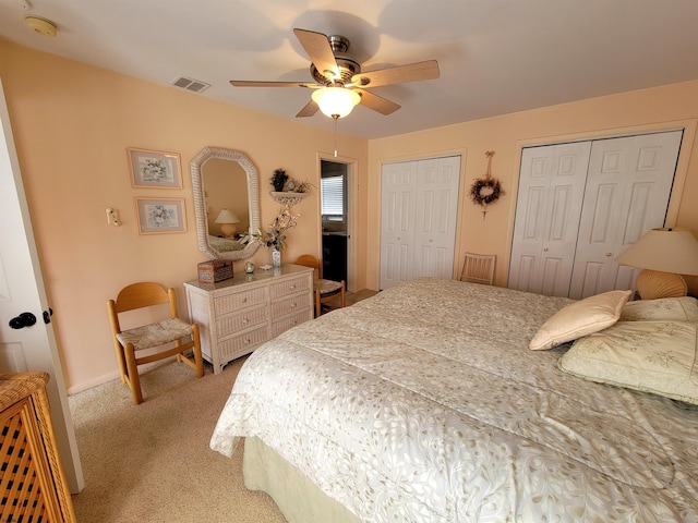 305 57th St Unit 305, Ocean City, NJ 08226 - bedroom featuring a ceiling fan, two closets, light carpet, and visible vents